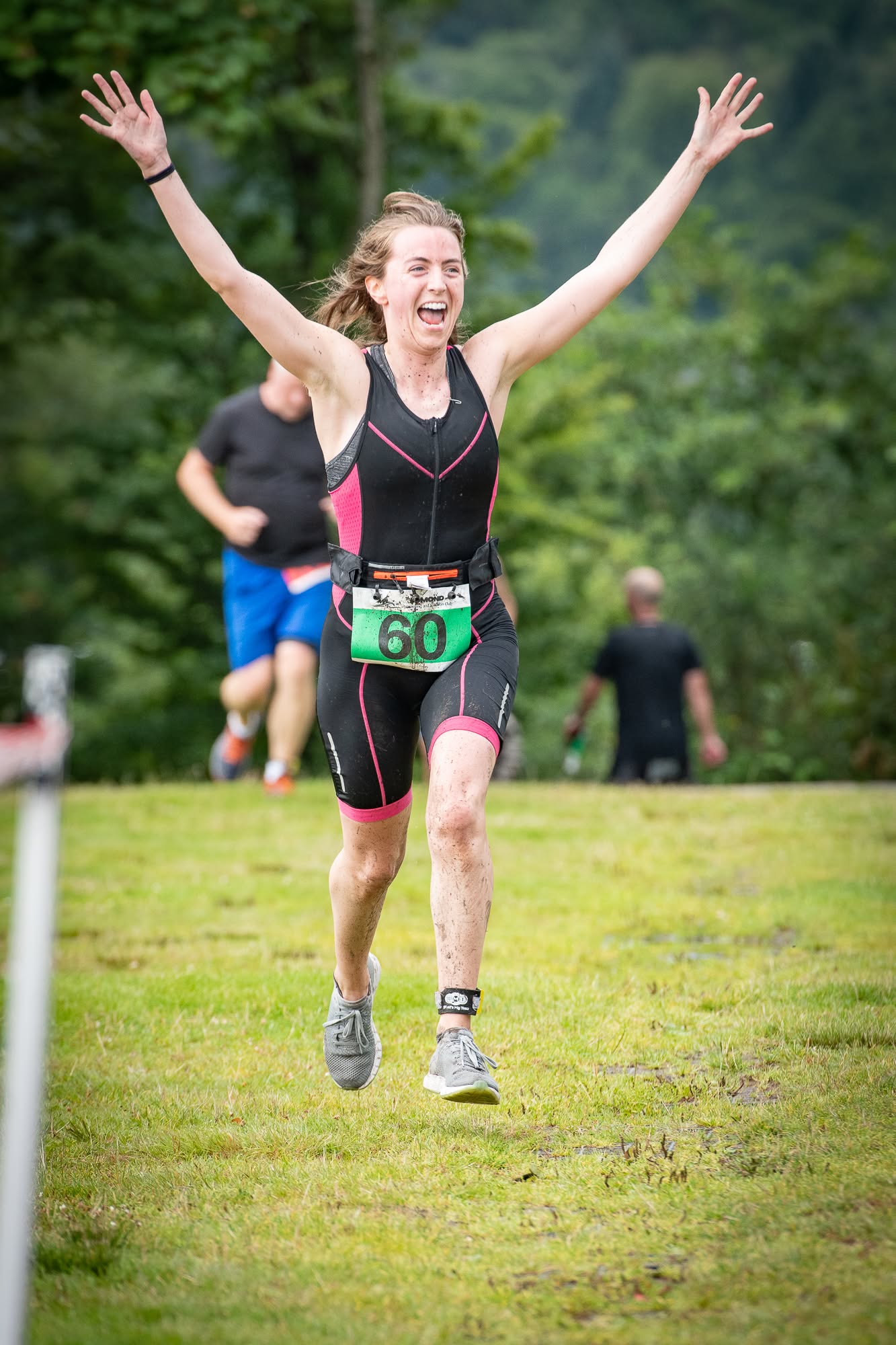 A Beastie finisher crossing the line with both arms raised